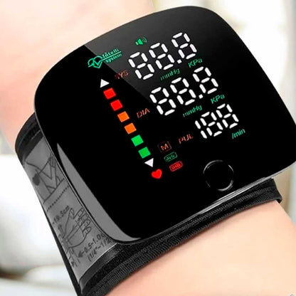 Monitor de presión arterial de muñeca con voz recargable